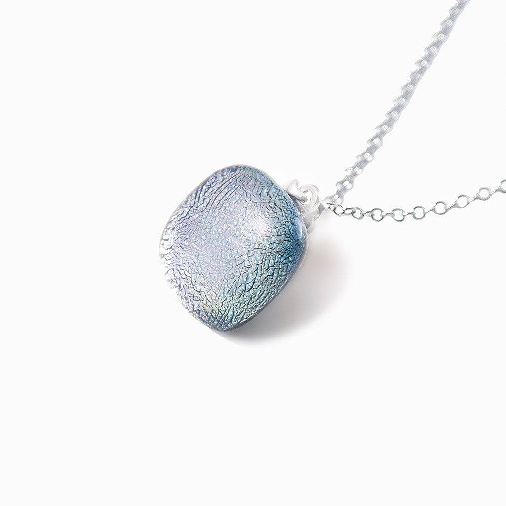 NECKLACE SILVER PEARL ~ AQUA | SQUIRCLE | REFLET[proNECKLACE SILVER PEARL ~ AQUAduct_vendor]MicrocosmosPRODUCT INFORMATION

Exlusive Microcosmoses Glass Reflet
Bead size length: 14 mm / 0.55" |  width: 14 mm / 0.55"

Base chain: Sterling Silver 925 ~ Stainless Steel 
NECKLACE